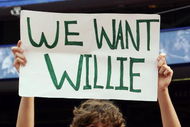 NEW YORK - JUNE 23:  A fan of the New York Mets holds a banner in reference to recently fired manager Willie Randolph prior to the game against the Seattle Mariners on June 23, 2008 at Shea Stadium in the Flushing neighborhood of the Queens borough of New York City.  (Photo by Jim McIsaac/Getty Images)