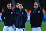JOHANNESBURG, SOUTH AFRICA - JUNE 28: Jay DeMerit (L), Carlos Bocanegra and Conor Casey (R) of The USA show their dejection at the end of the FIFA Confederations Cup Final between USA and Brazil at the Ellis Park Stadium on June 28, 2009 in Johannesburg, South Africa. (Photo by Laurence Griffiths/Getty Images)