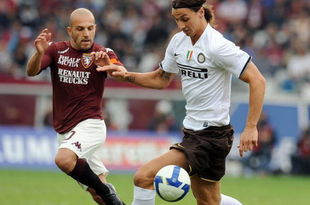 TURIN, ITALY - SEPTEMBER 21: Alessandro Rosina of Turin and Zlatan Ibrahimovic of Inter Milan in action during the Serie A match between Turin and Inter Milan at the Stadio Olimpico on September 21, 2008 in Turin, Italy. (Photo by New Press/Getty Images)