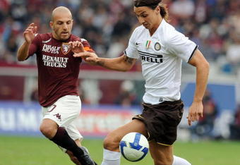 TURIN, ITALY - SEPTEMBER 21: Alessandro Rosina of Turin and Zlatan Ibrahimovic of Inter Milan in action during the Serie A match between Turin and Inter Milan at the Stadio Olimpico on September 21, 2008 in Turin, Italy. (Photo by New Press/Getty Images)