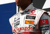 BUDAPEST, HUNGARY - JULY 26:  Lewis Hamilton of Great Britain and McLaren Mercedes celebrates on the podium after winning the Hungarian Formula One Grand Prix at the Hungaroring on July 26, 2009 in Budapest, Hungary.  (Photo by Paul Gilham/Getty Images)