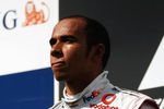 BUDAPEST, HUNGARY - JULY 26:  Lewis Hamilton of Great Britain and McLaren Mercedes celebrates on the podium after winning the Hungarian Formula One Grand Prix at the Hungaroring on July 26, 2009 in Budapest, Hungary.  (Photo by Paul Gilham/Getty Images)