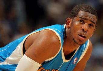 DENVER - APRIL 29:  Chris Paul #3 of the New Orleans Hornets looks on during a break in the action against the Denver Nuggets in Game Five of the Western Conference Quarterfinals during the 2009 NBA Playoffs at Pepsi Center on April 29, 2009 in Denver, Colorado. The Nuggets defeated the Hornets 107-86 to advance to the Western Conference Semifinals against Dallas. NOTE TO USER: User expressly acknowledges and agrees that, by downloading and or using this photograph, User is consenting to the terms and conditions of the Getty Images License Agreement.  (Photo by Doug Pensinger/Getty Images)