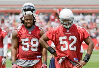 TEMPE, AZ - MAY 2 :  Will Davis #59 and Cody Brown #52 of the Arizona Cardinals watch a drill during a team minicamp at the team training facility on May 2, 2009 in Tempe, Arizona.  (Photo by Jonathan Willey/Getty Images)
