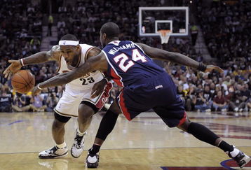 CLEVELAND - MAY 05: Marvin Williams #24 of the Atlanta Hawks steals the ball from LeBron James #23 of the Cleveland Cavaliers in Game One of the Eastern Conference Semifinals during the 2009 NBA Playoffs at Quicken Loans Arena on May 5, 2009 in Cleveland, Ohio.  NOTE TO USER: User expressly acknowledges and agrees that, by downloading and or using this photograph, User is consenting to the terms and conditions of the Getty Images License Agreement.  (Photo by Gregory Shamus/Getty Images)