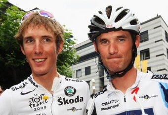 MARTIGNY, SWITZERLAND - JULY 21:  Andy Schleck (l) of Luxembourg and Team Saxo Bank arrives at the start with team mate and brother Frank on stage 16 of the 2009 Tour de France from Martigny to Bourg-Saint-Maurice on July 21, 2009 in Martigny, Switzerland.  (Photo by Bryn Lennon/Getty Images)
