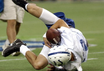 Indianapolis Colts quarterback Jim Sorgi dives for a loose ball during a practice on Friday, August 5, 2005 at the Tokyo Dome in Japan.  (Photo by Al Messerschmidt/Getty Images)