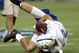 Indianapolis Colts quarterback Jim Sorgi dives for a loose ball during a practice on Friday, August 5, 2005 at the Tokyo Dome in Japan.  (Photo by Al Messerschmidt/Getty Images)