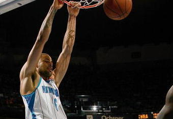 NEW ORLEANS - DECEMBER 30:  Tyson Chandler #6 of the New Orleans Hornets dunks the ball against the Washington Wizards on December 30, 2008 at the New Orleans Arena in New Orleans, Louisiana.  NOTE TO USER: User expressly acknowledges and agrees that, by downloading and/or using this Photograph, user is consenting to the terms and conditions of the Getty Images License Agreement.  The Hornets defeated the Wizards 97-85.  (Photo by Chris Graythen/Getty Images)