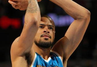 DENVER - APRIL 22:  Tyson Chandler #6 of the New Orleans Hornets takes a free throw against the Denver Nuggets in Game Two of the Western Conference Quarterfinals during the 2009 NBA Playoffs at Pepsi Center on April 22, 2009 in Denver, Colorado. The Nuggets defeated the Hornets 108-93. NOTE TO USER: User expressly acknowledges and agrees that, by downloading and or using this photograph, User is consenting to the terms and conditions of the Getty Images License Agreement.  (Photo by Doug Pensinger/Getty Images)