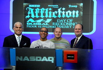 NEW YORK - JANUARY 20:  MMA fighter and former UFC light heavyweight champion Tito Ortiz, VP, Affliction Entertainment Tom Atencio and Fedor Vladimirovich Emelianenko, heavyweight mixed martial artist and current World Alliance of Mixed Martial Arts heavyweight champion rings the NASDAQ opening bell at NASDAQ in Times Square on January 20, 2009 in New York City.  (Photo by Joe Corrigan/Getty Images)
