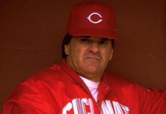 Manager Pete Rose of the Cincinnati Reds looks on from the dugout at Candlestick Park in San Francisco, California.