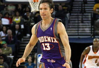OAKLAND, CA - MARCH 15:  Steve Nash #13 of the Phoenix Suns dribbles the ball against the Golden State Warriors during an NBA game on March 15, 2009 at Oracle Arena in Oakland, California. NOTE TO USER: User expressly acknowledges and agrees that, by downloading and or using this photograph, User is consenting to the terms and conditions of the Getty Images License Agreement.  (Photo by Jed Jacobsohn/Getty Images)
