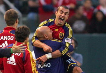 CARSON, CA - JUNE 13:  Yuri Movsisyan #14 of Real Salt Lake celebrates his first half goal against the Los Angeles Galaxy with the Real Salt Lake bench during the MLS match at The Home Depot Center on June 13, 2009 in Carson, California. Real Salt Lake defeated the Galaxy 2-0. (Photo by Victor Decolongon/Getty Images)