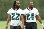 PHILADELPHIA - MAY 1: Defensive backs Asante Samuel #22 and Sheldon Brown #24 of the Philadelphia Eagles smile as they look on during minicamp at the NovaCare Complex on May 1, 2009 in Philadelphia, Pennsylvania. (Photo by Hunter Martin/Getty Images)