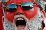 TUSCALOOSA, AL - NOVEMBER 03:  An Alabama fan cheers as the LSU Tigers take on the Alabama Crimson Tide at Bryant-Denny Stadium on November 3, 2007 in Tuscaloosa, Alabama. LSU defeated Alabama 41-34.  (Photo by Doug Benc/Getty Images)