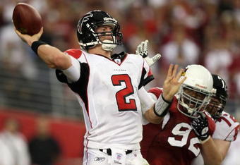 GLENDALE, AZ - JANUARY 03:  Quarterback Matt Ryan #2 of the Atlanta Falcons throws a pass under pressure from Bertrand Berry #92 of the Arizona Cardinals during the NFC Wild Card Game on January 3, 2009 at University of Phoenix Stadium in Glendale, Arizona.  (Photo by Jed Jacobsohn/Getty Images)