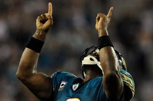 JACKSONVILLE, FL - DECEMBER 18:  David Garrard #9 of the Jacksonville Jaguars celebrates a touchdown during the game against the Indianapolis Colts at Jacksonville Municipal Stadium on December 18, 2008 in Jacksonville, Florida.  (Photo by Sam Greenwood/Getty Images)