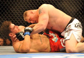 LAS VEGAS - JULY 11:  Brock Lesnar holds down Frank Mir during their heavyweight title bout during UFC 100 on July 11, 2009 in Las Vegas, Nevada.  (Photo by Jon Kopaloff/Getty Images)