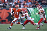 CINCINNATI - DECEMBER 28: Ryan Fitzpatrick #11 of the Cincinnati Bengals runs with the ball while defended by Brandon Flowers #24 of the Kansas City Chiefs during the NFL on December 28, 2008 at Paul Brown Stadium in Cincinnati, Ohio. (Photo by Andy Lyons/Getty Images)