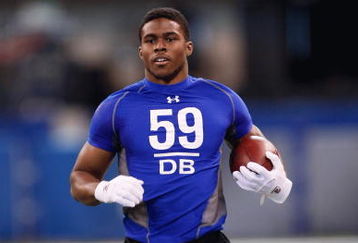 INDIANAPOLIS, IN - FEBRUARY 24:  Defensive back Jahi Word-Daniels of Georgia Tech runs with the football in practice drills during the NFL Scouting Combine presented by Under Armour at Lucas Oil Stadium on February 24, 2009 in Indianapolis, Indiana. (Photo by Scott Boehm/Getty Images)
