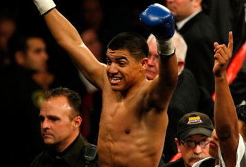 LAS VEGAS - DECEMBER 06:  Victor Ortiz celebrates after knocking out Jeffrey Resto in the second round of their NABO junior welterweight title fight at the MGM Grand Garden Arena December 6, 2008 in Las Vegas, Nevada.  (Photo by Ethan Miller/Getty Images)
