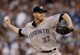 NEW YORK _ JUNE 3:  Roy Halladay #32 of the Toronto Blue Jays delivers a pitch during the game against the New York Yankees on June 3, 2008 at Yankee Stadium in the Bronx borough of New York City. (Photo by: Nick Laham/Getty Images)