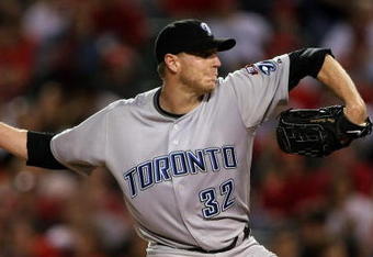 ANAHEIM, CA - MAY 6:  Roy Halladay #32 of the Toronto Blue Jays throws a pitch against the Los Angeles Angels of Anaheim at Angel Stadium May 6, 2009 in Anaheim, California.  (Photo by Stephen Dunn/Getty Images)