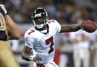 6 Jan 2002: Quarterback Michael Vick #7 of the Atlanta Falcons scrambles against the St. Louis Rams at the Dome at America's Center in St. Louis, Missouri. DIGITAL IMAGE. Mandatory Credit: Elsa /Getty Images