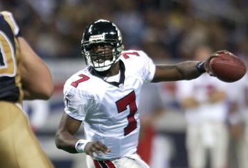 6 Jan 2002: Quarterback Michael Vick #7 of the Atlanta Falcons scrambles against the St. Louis Rams at the Dome at America's Center in St. Louis, Missouri. DIGITAL IMAGE. Mandatory Credit: Elsa /Getty Images