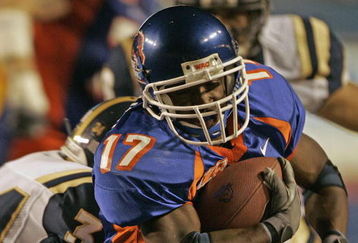 BOISE, ID - SEPTEMBER 24:  Lee Marks #17 of Boise State is hit by Brandon Heaney (L) of BYU September 24, 2004 at Broncos Stadium in Boise, Idaho.  BSU won over BYU 28-27. (Photo by George Frey/Getty Images)