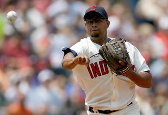 CLEVELAND - JULY 27:  Andy Marte #15 of the Cleveland Indians throws during the game against the Minnesota Twins at Progressive Field on July 27, 2008 in Cleveland, Ohio.  (Photo by: Gregory Shamus/Getty Images)