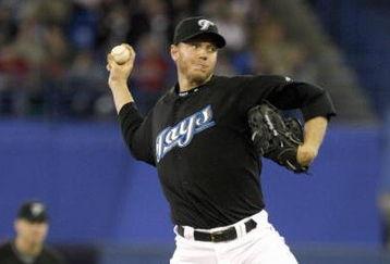 TORONTO - APRIL 6: Roy Halladay #32 of the Toronto Blue Jays delivers a pitch against the Boston Red Sox during their MLB game at the Rogers Centre April 6, 2008 in Toronto, Ontario. (Photo By Dave Sandford/Getty Images)