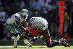IRVING, TX - OCTOBER 26:  Tight end Jerramy Stevens #86 of the Tampa Bay Buccaneers is tackled by Bradie James #56 and Mike Jenkins #31 of the Dallas Cowboys at Texas Stadium on October 26, 2008 in Irving, Texas.  (Photo by Ronald Martinez/Getty Images)