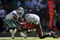 IRVING, TX - OCTOBER 26:  Tight end Jerramy Stevens #86 of the Tampa Bay Buccaneers is tackled by Bradie James #56 and Mike Jenkins #31 of the Dallas Cowboys at Texas Stadium on October 26, 2008 in Irving, Texas.  (Photo by Ronald Martinez/Getty Images)
