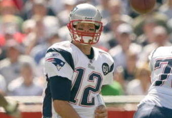 FOXBORO, MA - SEPTEMBER 7:  Quarterback Tom Brady #12 of the New England Patriots passes the ball up the middle during their NFL game against the Kansas City Chiefs on September 7, 2008 at Gillette Stadium in Foxboro, Massachusetts. The Patriots defeated the Chiefs 17-10. (Photo by Elsa Garrison/Getty Images)