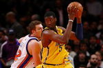 NEW YORK - FEBRUARY 23:  Roy Hibbert #55 of the Indiana Pacers goes up against David Lee #42 of the New York Knicks during the game at Madison Square Garden February 23, 2009 in New York City.  The Knicks won 123-119.  NOTE TO USER: User expressly acknowledges and agrees that, by downloading and/or using this Photograph, User is consenting to the terms and conditions of the Getty Images License Agreement.  (Photo by Chris McGrath/Getty Images)
