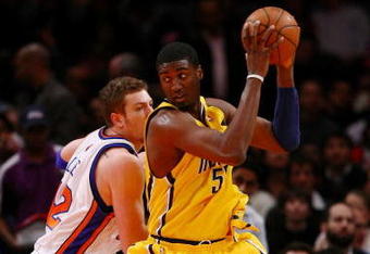 NEW YORK - FEBRUARY 23:  Roy Hibbert #55 of the Indiana Pacers goes up against David Lee #42 of the New York Knicks during the game at Madison Square Garden February 23, 2009 in New York City.  The Knicks won 123-119.  NOTE TO USER: User expressly acknowledges and agrees that, by downloading and/or using this Photograph, User is consenting to the terms and conditions of the Getty Images License Agreement.  (Photo by Chris McGrath/Getty Images)