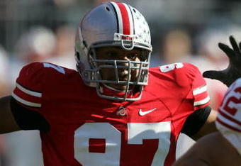 COLUMBUS, OH - NOVEMBER 03: Cameron Heyward #97 of the Ohio State Buckeyes chases down Tyler Donovan #12 of the Wisconsin Badgers on November 3, 2007 at Ohio Stadium in Columbus, Ohio. Ohio State defeated Wisconsin 38-17. (Photo by Jonathan Daniel/Getty Images)