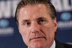 UNIONDALE, NY - AUGUST 13: General Manager Garth Snow introduces Scott Gordon as the new head coach of the New York Islanders at a press conference on August 13, 2008 at the Nassau Coliseum in Uniondale, New York. (Photo by Bruce Bennett/Getty Images)