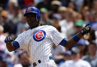 CHICAGO - MAY 2:  Alfonso Soriano #12 of the Chicago Cubs runs to first against the Florida Marlins during the game on May 2, 2009 at Wrigley Field in Chicago, Illinois. (Photo by Jonathan Daniel/Getty Images) 