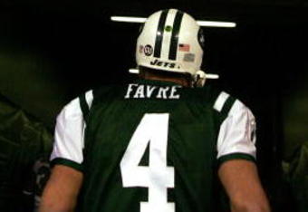 EAST RUTHERFORD, NJ - DECEMBER 28: Brett Favre #4 of The New York Jets leaves the field after losing to The Miami Dolphins 24-17 after their game on December 28, 2008 at Giants Stadium in East Rutherford, New Jersey. (Photo by Al Bello/Getty Images)
