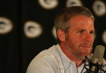 GREEN BAY, WI - MARCH 06: Quarterback Brett Favre of the Green Bay Packers listens to a question at his retirement press conference on March 6, 2008 at Lambeau Field in Green Bay, Wisconsin. (Photo by Jonathan Daniel/Getty Images)