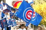 CHICAGO - OCTOBER 13:  Enthusiasts shop for Chicago Cubs merchandise near Wrigley Field October 13, 2003 Chicago, Illinois. The Cubs are one win away from playing in their first World Series since 1949.  (Photo by Tim Boyle/Getty Images)