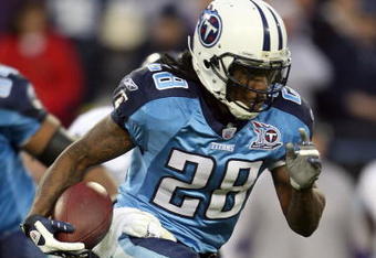 NASHVILLE, TN - JANUARY 10:  Running back Chris Johnson #28 of the Tennessee Titans runs the ball in the first quarter against the Baltimore Ravens during the AFC Divisional Playoff Game on January 10, 2009 at LP Field in Nashville, Tennessee.  (Photo by Andy Lyons/Getty Images)
