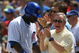 CHICAGO - JULY 26: Senator Richard Durbin (D-IL) joins Chicago Cub fans in cheering Milton Bradley #21 after Bradley scored a run on a play at the plate in the 3rd inning against the Cincinnati Reds on July 26, 2009 at Wrigley Field in Chicago, Illinois. (Photo by Jonathan Daniel/Getty Images)