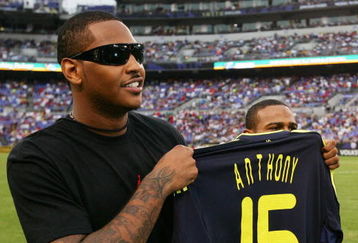 BALTIMORE - JULY 24: NBA player Carmelo Anthony holds up a personalized Chelsea FC jersey before the game between AC Milan and Chelsea FC at M & T Bank Stadium on July 24, 2009 in Baltimore, Maryland. (Photo by Ned Dishman/Getty Images)