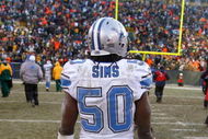GREEN BAY, WI - DECEMBER 28: Ernie Sims #50 of the Detroit Lions leaves the field after a loss to the Green Bay Packers on December 28, 2008 at Lambeau Field in Green Bay, Wisconsin. The Packers defeated the Lions 31-21. (Photo by Jonathan Daniel/Getty Images)