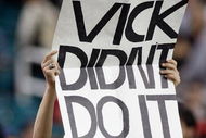 ATLANTA - DECEMBER 10: A man holds up a sign in support of Michael Vick formerly of the Atlanta Falcons during the game against the New Orleans Saints on December 10, 2007 at the Georgia Dome in Atlanta, Georgia. The Saints defeated the Falcons 34-14. (Photo by Chris Graythen/Getty Images)