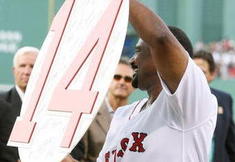 BOSTON - JULY 28:  Former Boston Red Sox outfielder Jim Rice shows off his retired number plaque during a ceremony before the Boston Red Sox game against the Oakland Athletics at Fenway Park July 28, 2009 in Boston, Massachusetts.  (Photo by Elsa/Getty Images)